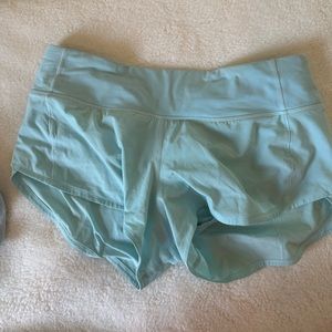 Turquoise speed up lulu shorts size 4 reg 2.5 inch